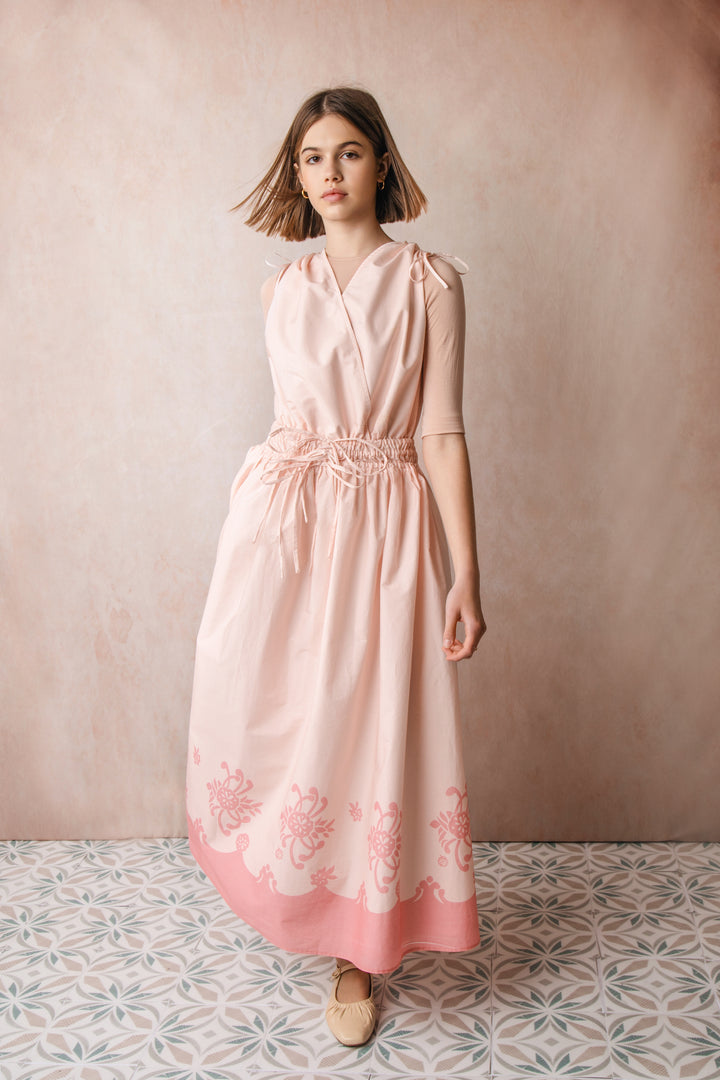 HDR605-SHOULDER AND WAIST PULLY STRINGS DRESS WITH HEM BORDER PRINT-Pink