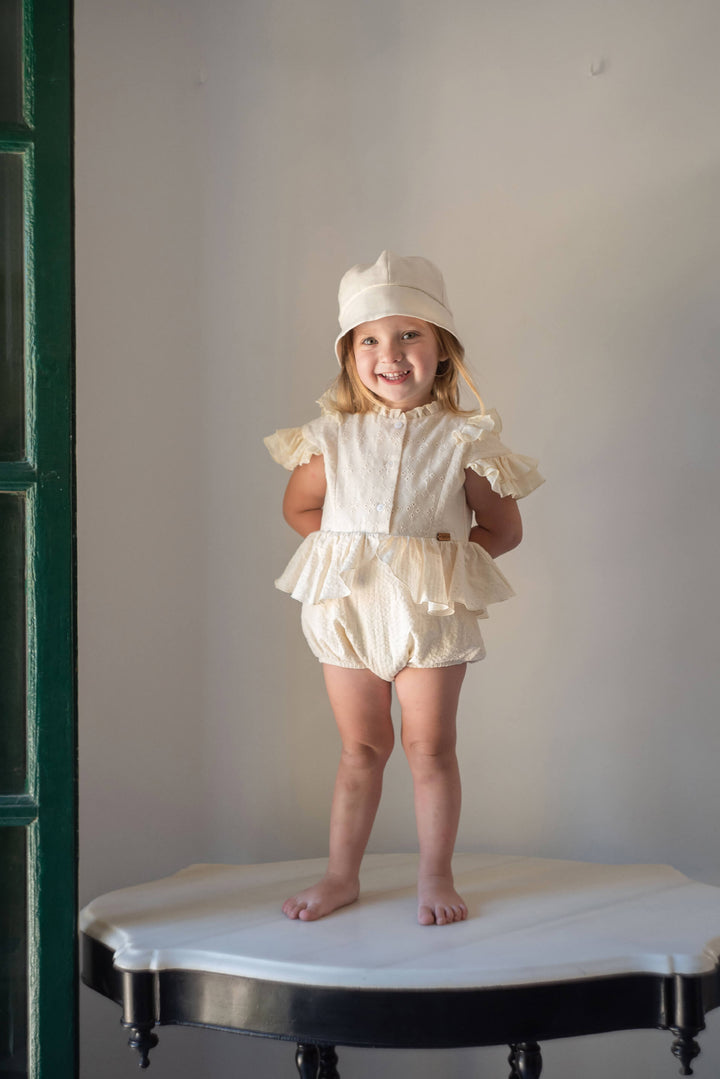 Mod 2.1 Off-white contrasting romper suit with frills